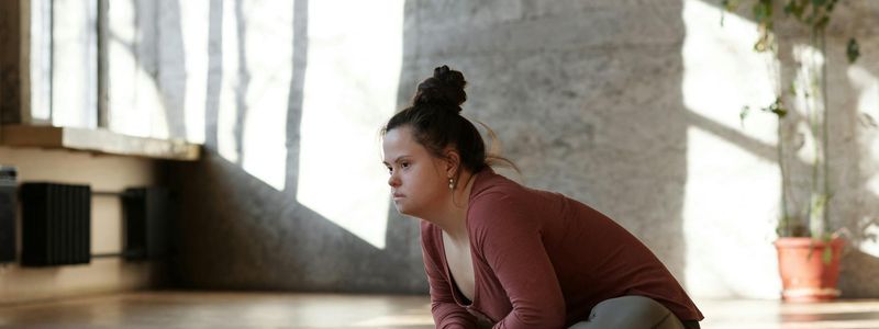 Serene morning light falling on a wooden yoga floor